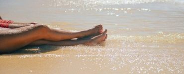 gambe donna spiaggia
