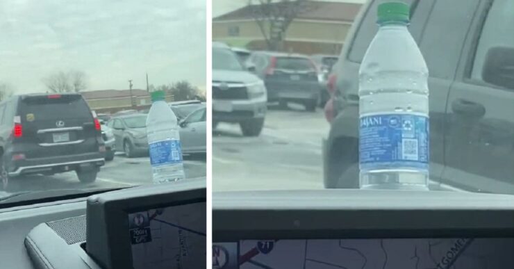 bottiglia d'acqua sul cofano dell'auto