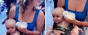 Mamma distratta dà il biberon al figlio nell'orecchio