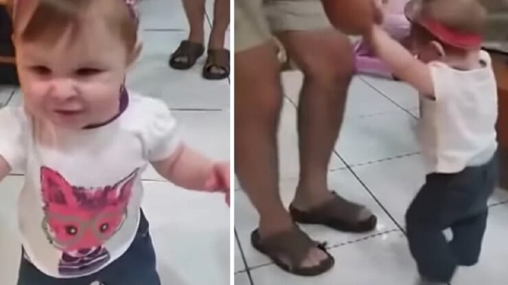 Neonata di 9 mesi balla la salsa con il nonno