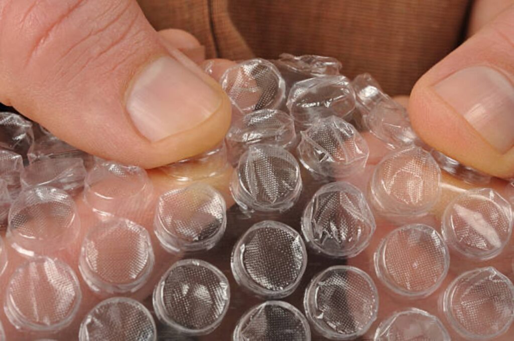 Capelli ricci con il pluriball