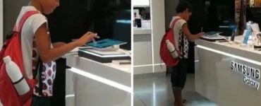 Ragazzo studia su un tablet in un negozio Samsung