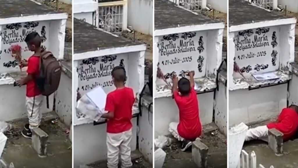 Bambino porta i fiori sulla tomba della madre